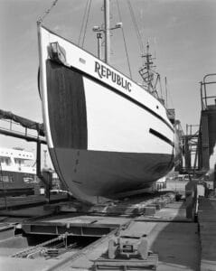 Black and white photo of a boat ready for launch