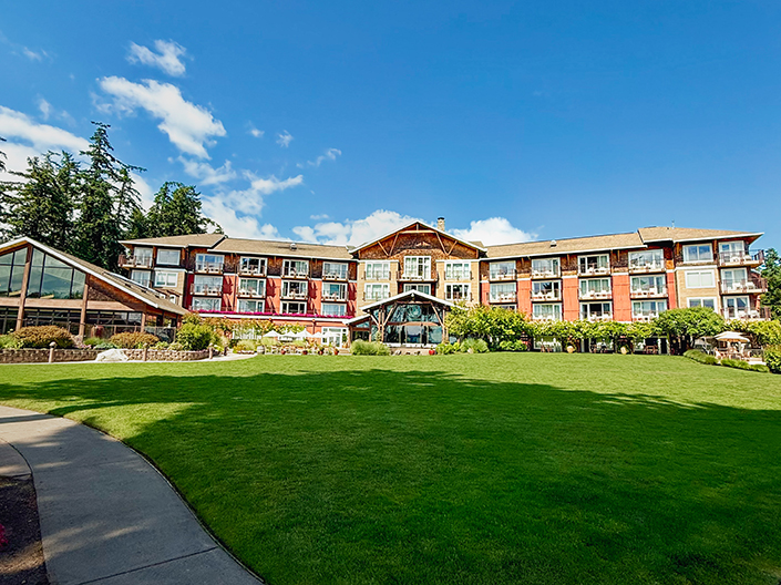 Exterior view of the Suquamish Clearwater Casino and Resort on a sunny day.